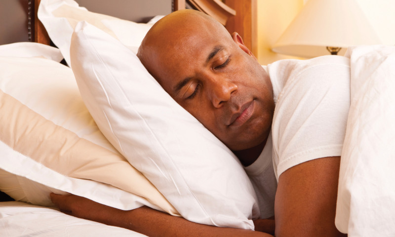 Man sleeping sleep weight management health