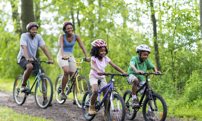 Family Riding Bikes through Physical Fitness