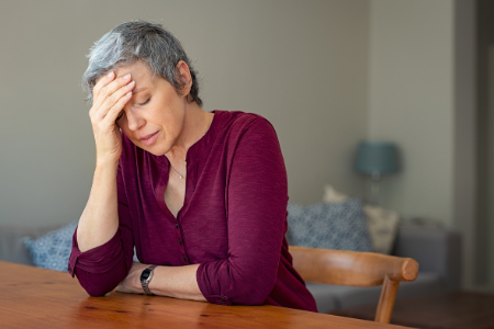 Picture of a woman upset from stress