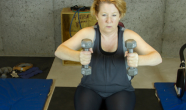 Middle Age Woman Doing Resistance Training