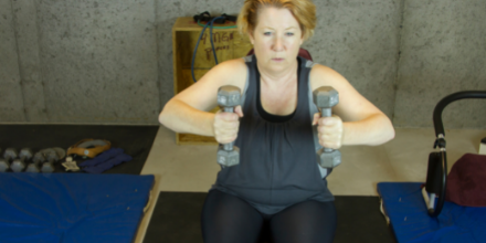 Middle Age Woman Doing Resistance Training