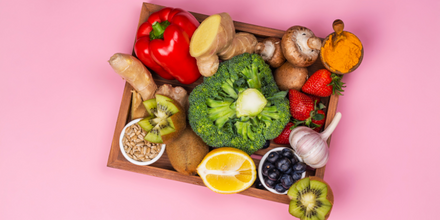 Immune system-boosting foods including broccoli, red pepper, lemons, ginger and legumes