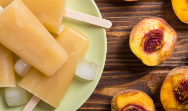 Peach popsicle representing summer treats in this blog post