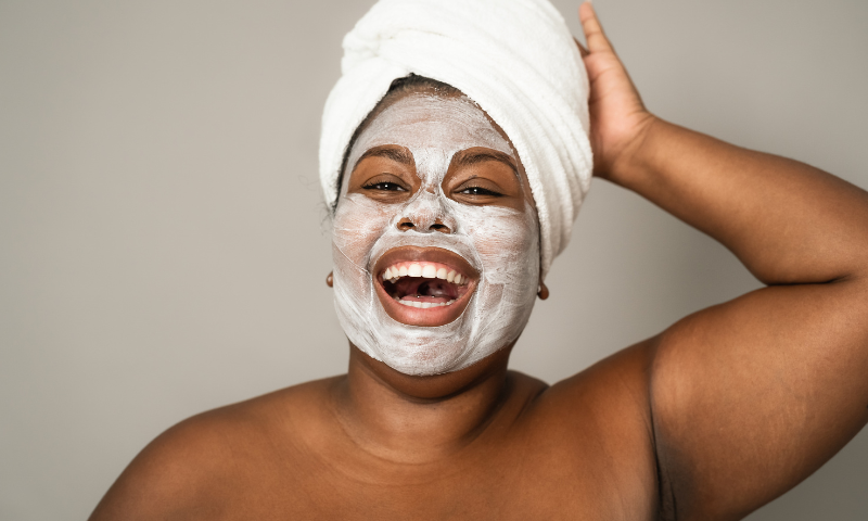 A woman having on a face mask as a form of self care.