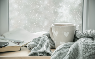 Warm beverage in window in cold weather